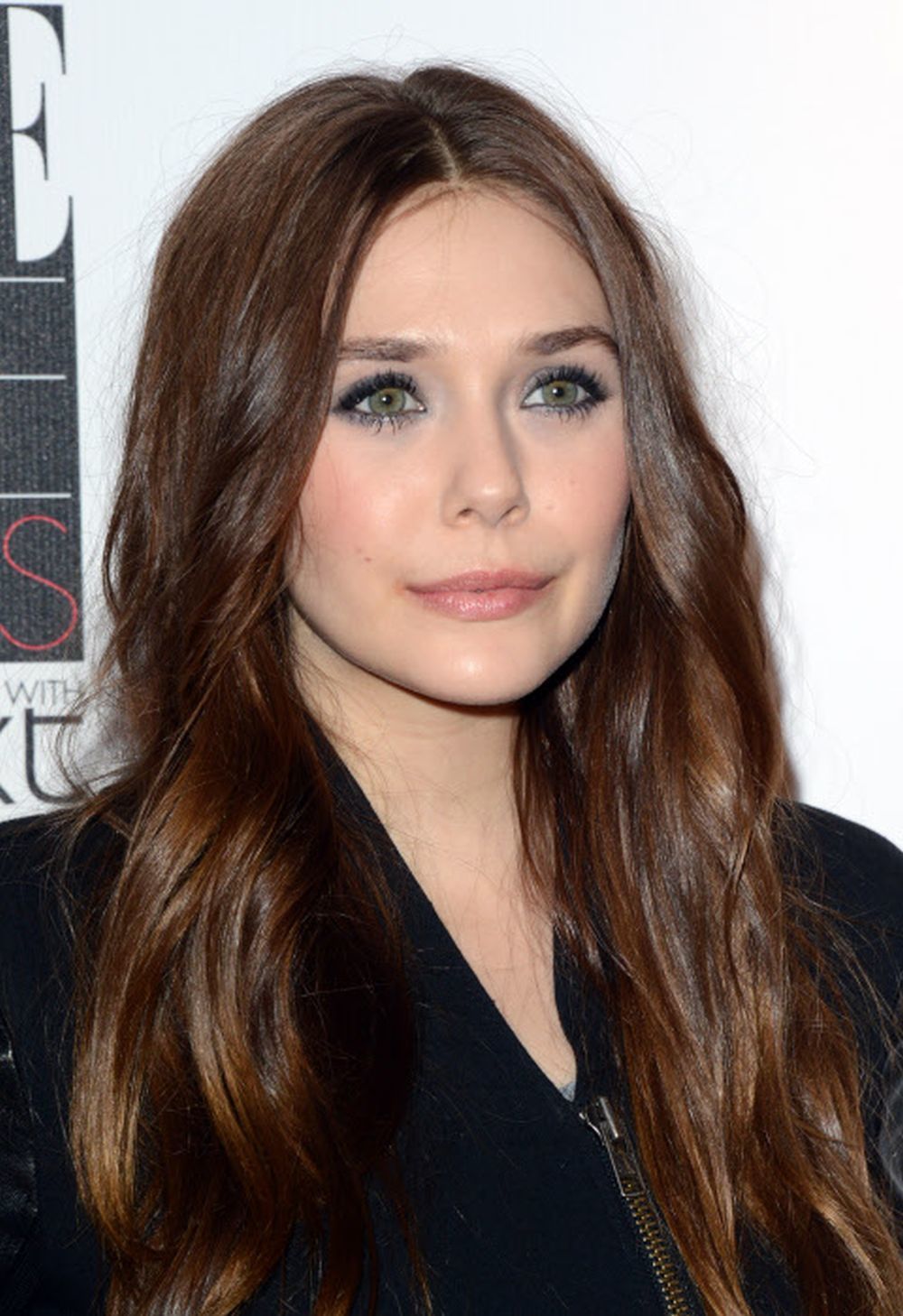 Con el pelo castao y ultrabrillante en 2013, Elizabeth Olsen es fan de los cambios de look.