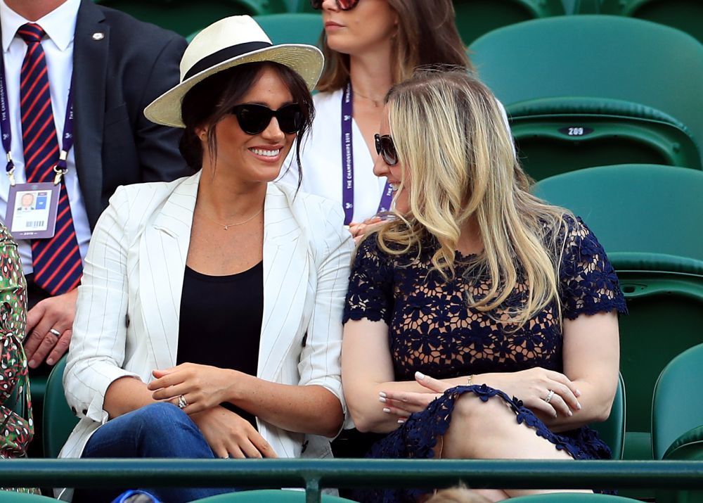 La Duquesa de Sussex con una amiga en Wimbledon.