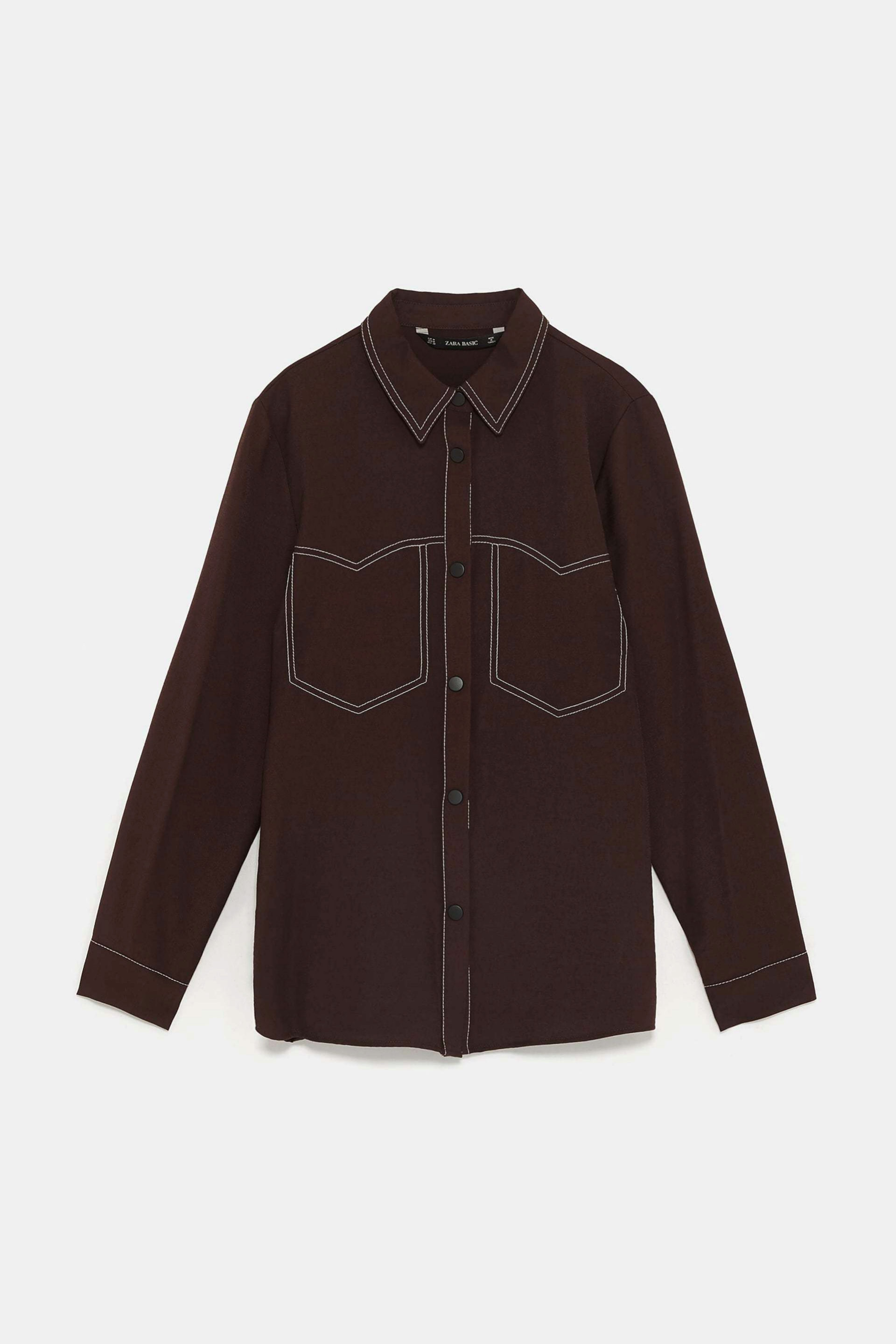 Camisa con pespuntes en marrn chocolate de Zara (9,99)