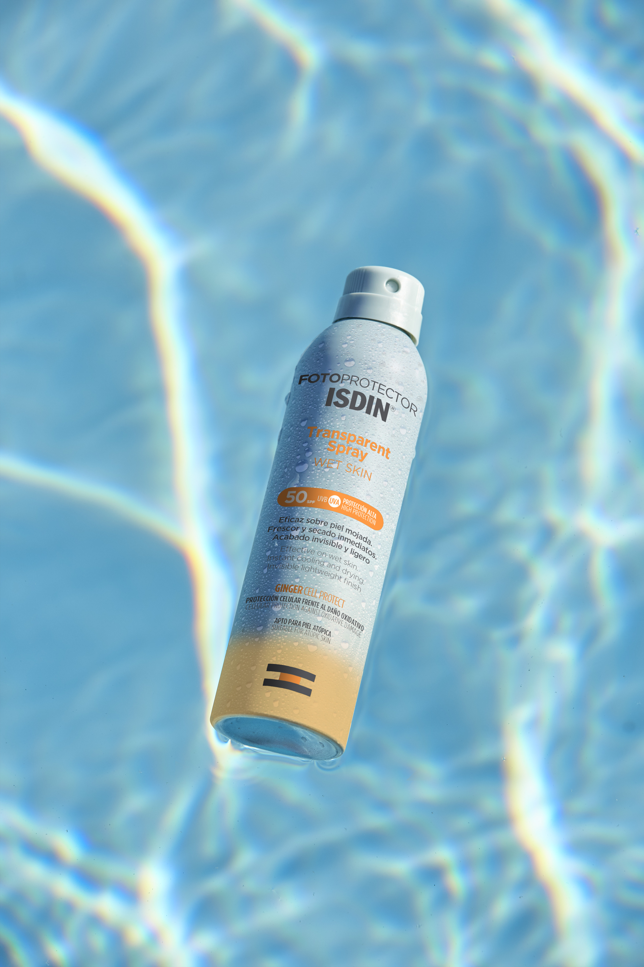 Fotoprotector ISDIN Transparent Spray WET SKIN el fotoprotector corporal invisible, fresco y ligero para la piel mojada.