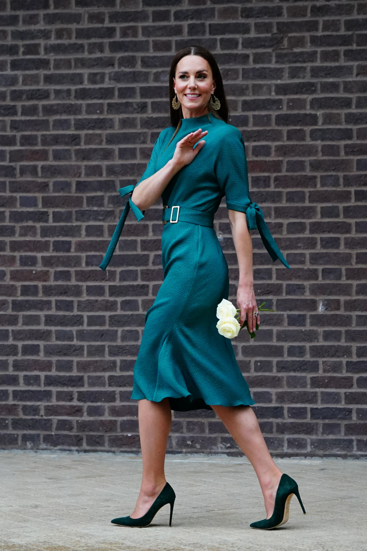 Kate Middleton con un vestido verde, inspiración para las invitadas de boda de otoño.