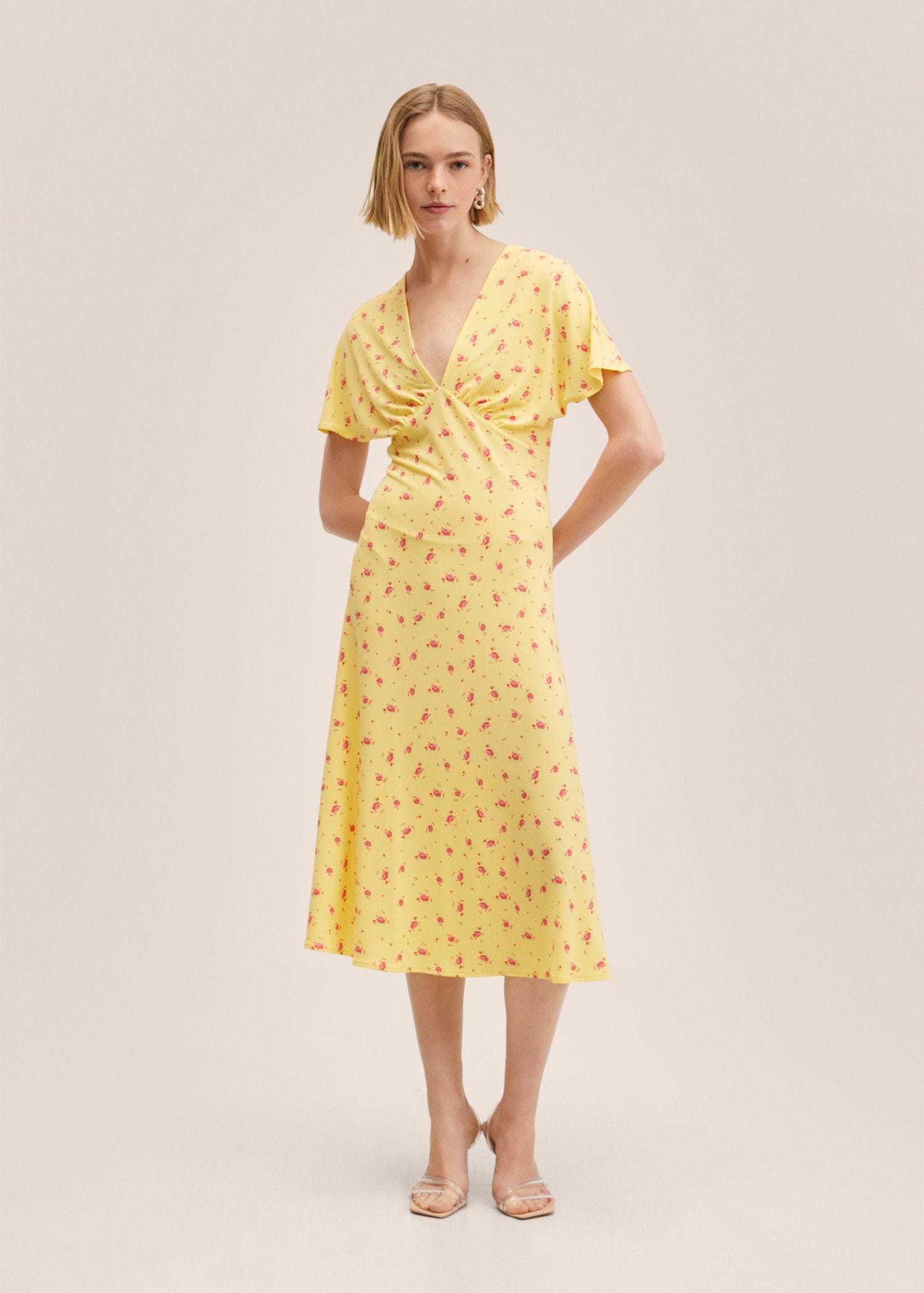 Yellow dress with flowers, by Mango.