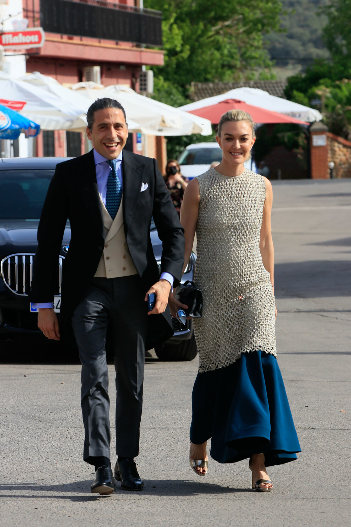 Marta Ortega con un vestido red en una boda en julio de 2021.