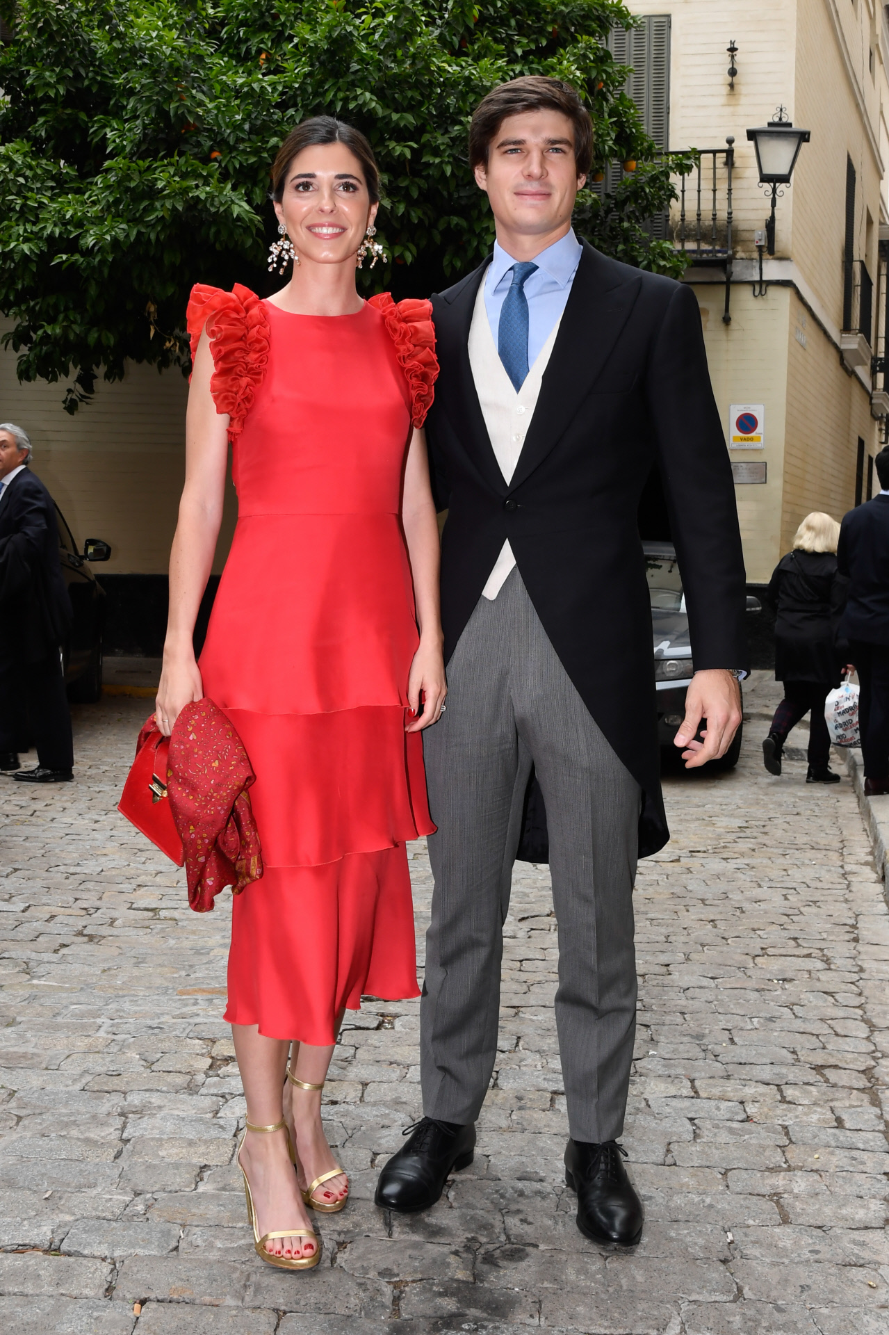 Belén Corsini, una invitada con vestido rojo en la boda de su hermano Borja.