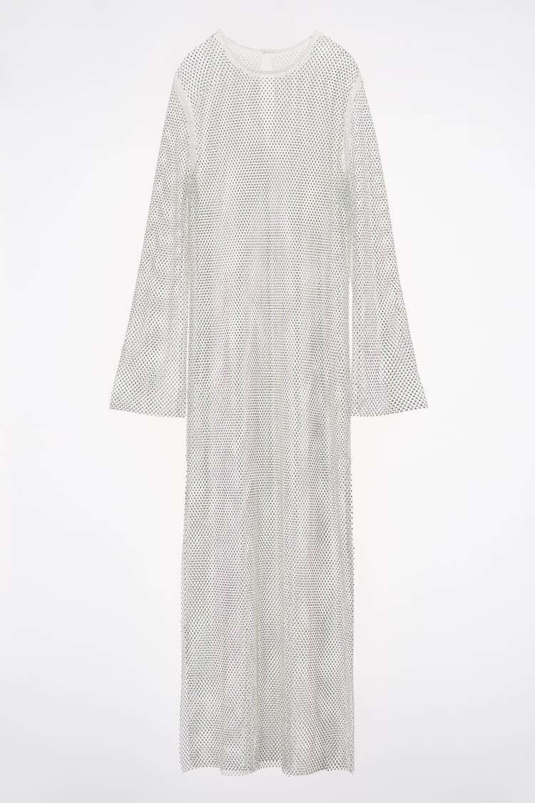 Vestido de red con brillos. Zara (99,95 euros)