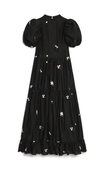 Vestido negro de mangas abullonadas de Sister Jane (214 euros).