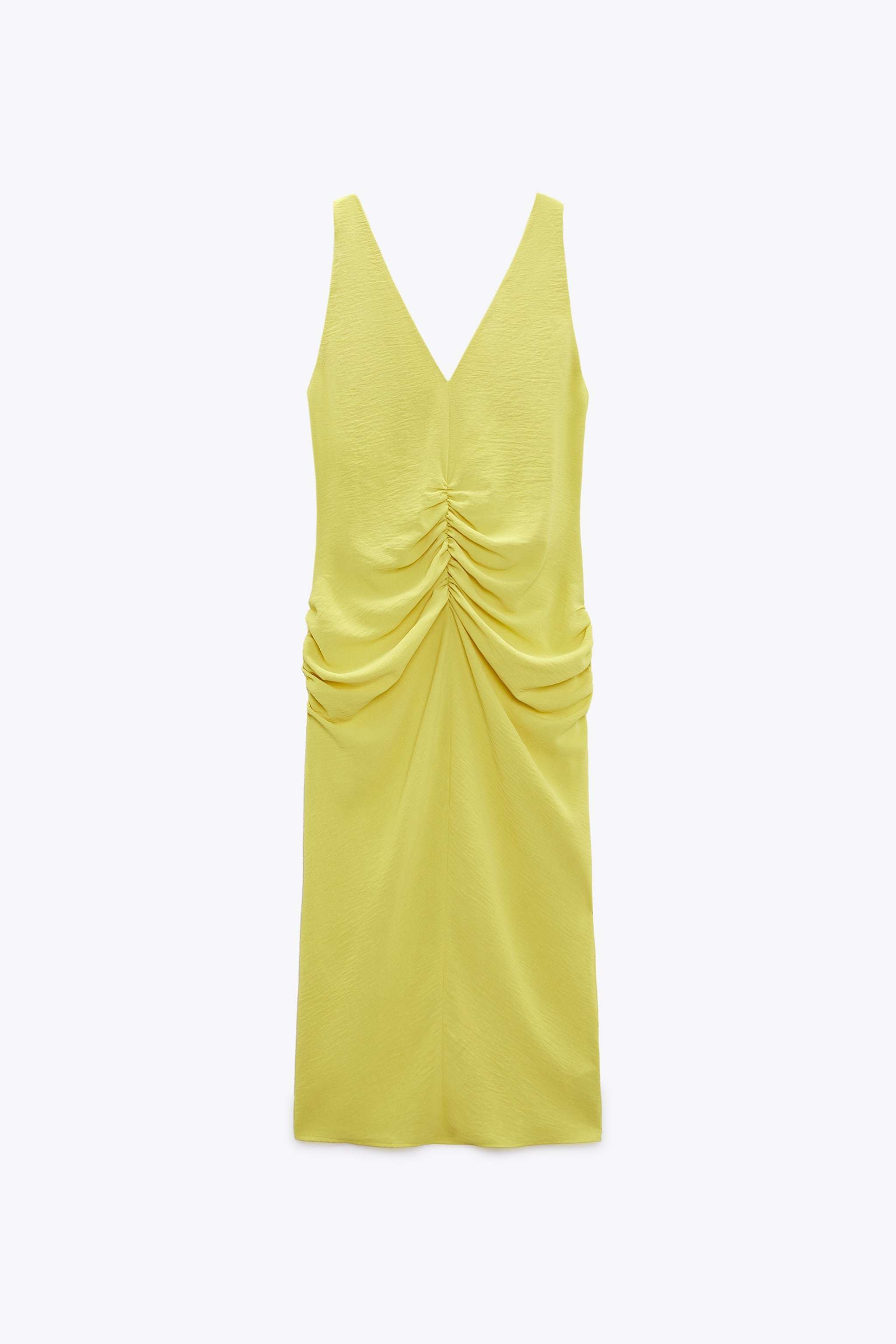 Vestido sin mangas amarillo, de Zara (25,95 euros).