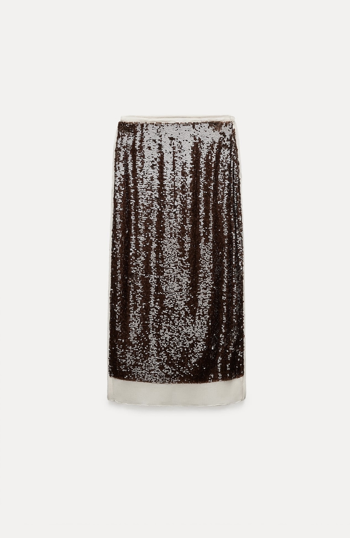 Falda de gasa y lentejuelas de Zara (49,95 euros).