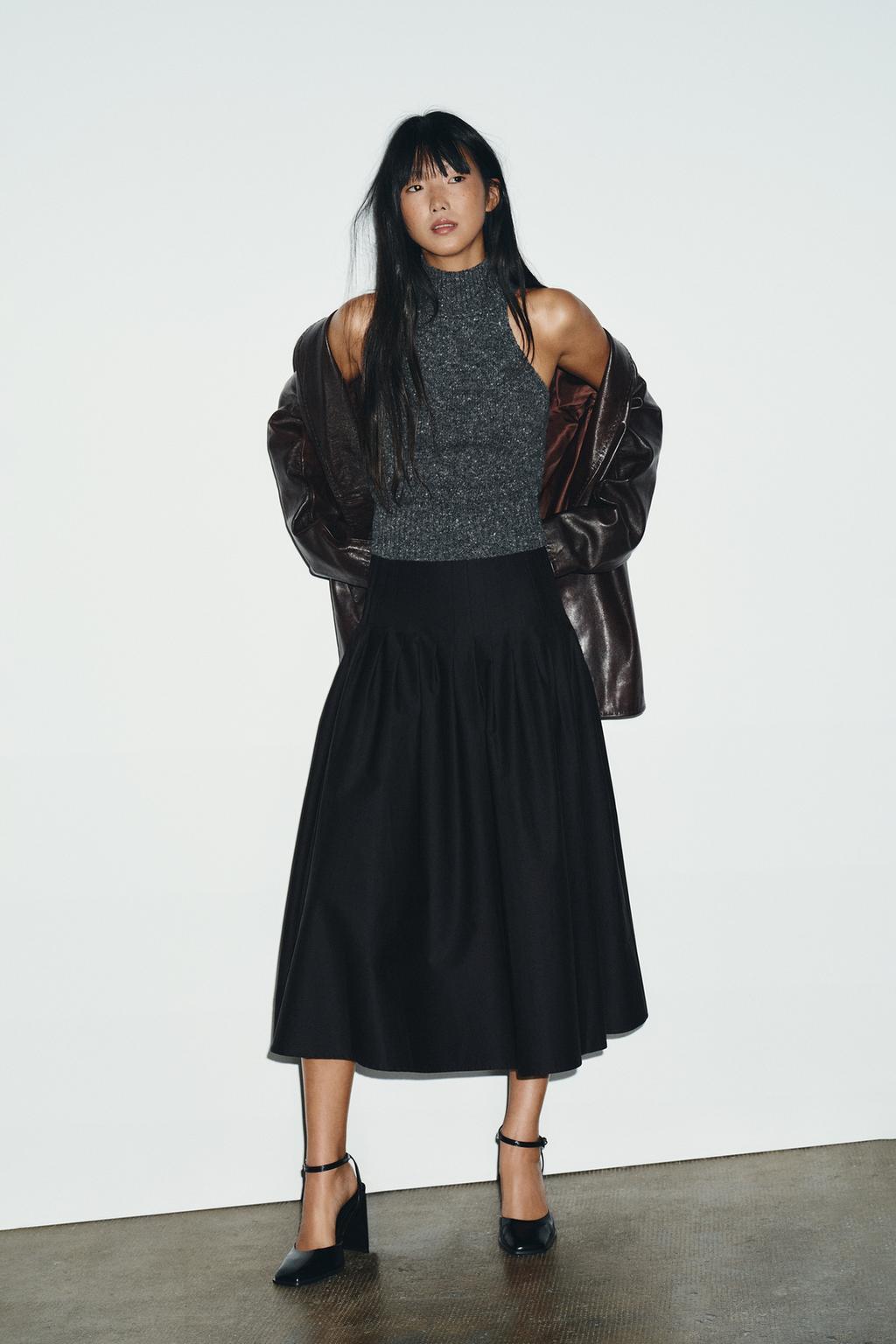 Jersey sin mangas de Zara.